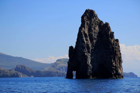 Rocks jutting out of the sea Faraglioni di Lipari at the southern tip of Lipari