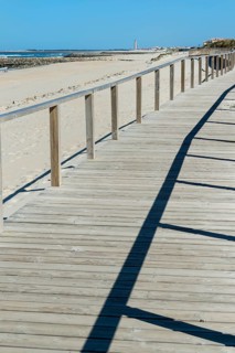 Wooden walkway on the beach Costa Nova
