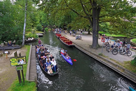 Tourists in Spreewald barges in the village of Lehde