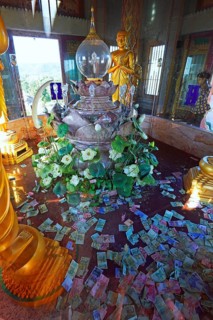 The holy of holies with banknotes as donations