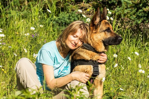 Woman and German Shepherd