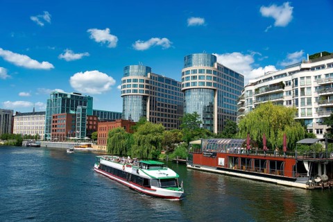 Excursion boat on the river Spree at Spreebogenpark in Berlin Moabit