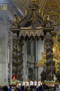 Pope celebrates Saint Mass in St Peter's Basilica in front of faithful Christians