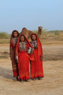 Fakirani woman in traditional dress with a water jug