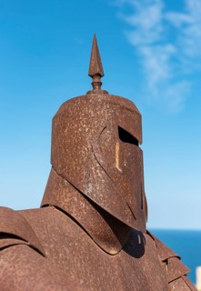 Metal statue of knight in armor