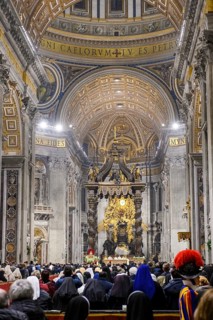 Pope celebrates Saint Mass in St Peter's Basilica in front of faithful Christians