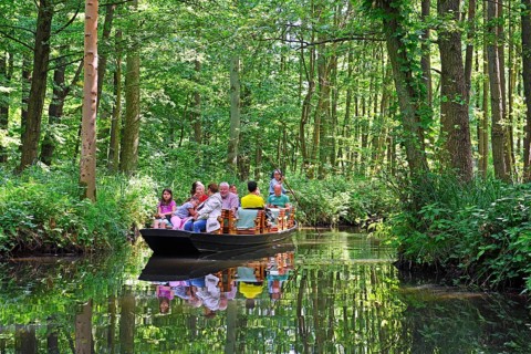 Tourists in typical barges along the Spree