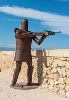 Metal statue of knight in armor