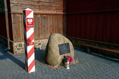 Memorial stone at the wooden church