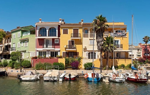 Yachts and colorful houses