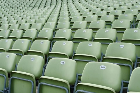 Green folding seats on the grandstand of the Seebuehne