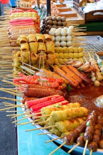 Various skewers with meat and seafood