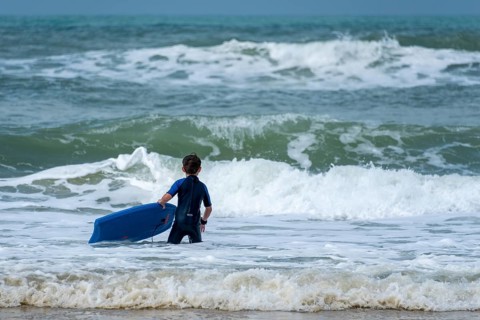 Boy with bodyboard