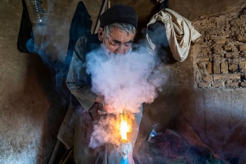 Sufi man smoking marihuana