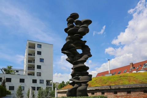 Large bronze sculpture by the artist Tony Cragg in the sculpture garden near the Venet House