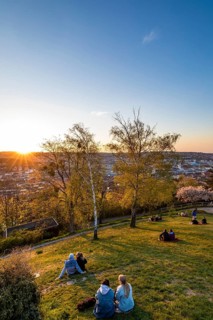 People at sunset in Weissenburgpark
