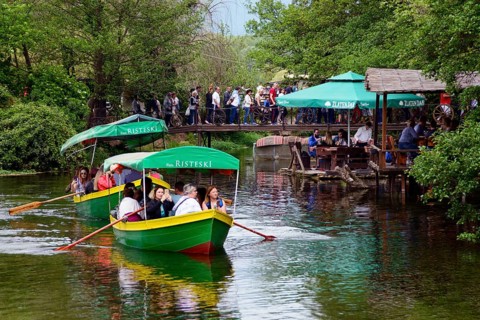 Boats and restaurants in the headwaters of Lake Ohrid