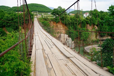 Suspension bridge at Suc over the river Mat