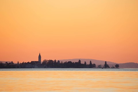 Church and harbour of Romanshorn in the evening light