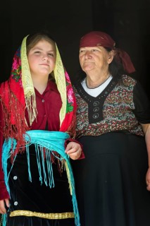 Grandmother and granddaughter in traditional dress
