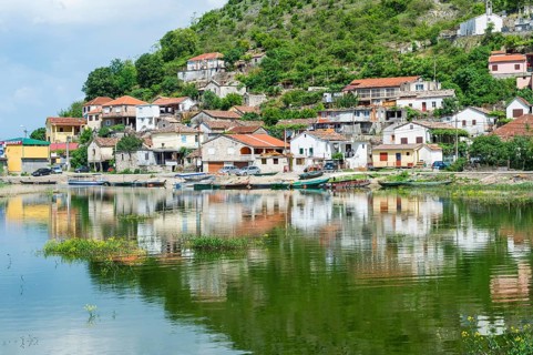 Small village reflected in the water
