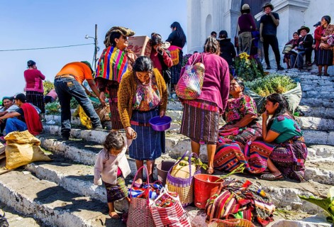 Picturesque rituals and flower offerings on the steps of Santo Tomas