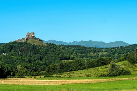 Castle of Murol and view on Sancy massif in Auvergne Volcanoes Natural Park