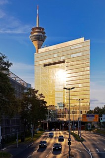 The city gate with the Rhine bank tunnel and the Rhine Tower