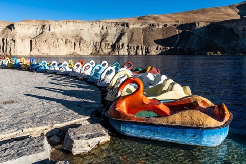 Paddleboats on the shore of a lake in the Unesco National Park