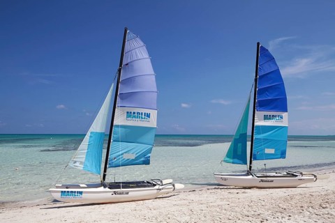 Sandy beach beach with two catamarans