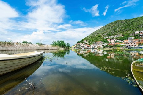 Small village reflected in the water