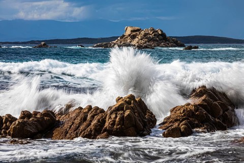 Stormy sea on the rocky coast of Isola Maddalena