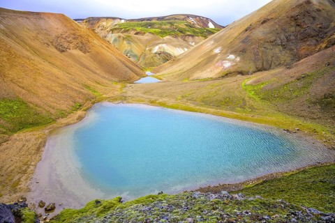 Turquoise lake at the foot of Brennisteinsalda