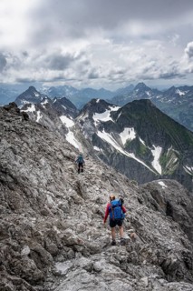 Hiker on a path on the rock