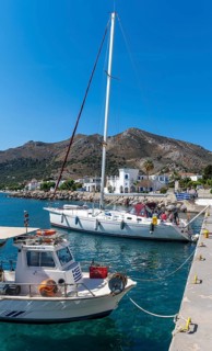 Sailboats in the harbour of Livadia on Tilos Island