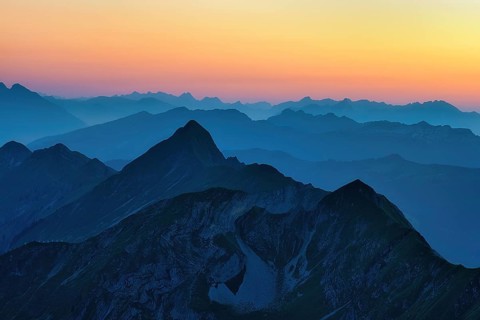 View of Bernese Alps at dusk from Brienzer Rothorn