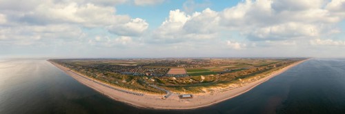 Large panoramic drone shot of the coast in front of Julianadorp aan Zee with a view of the beach