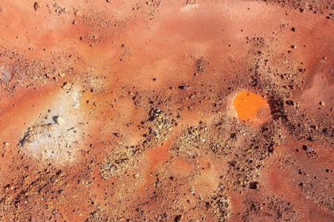 Little pool and extremely mineral-rich ground in the area of the Rio Tinto mines