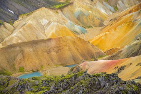 View from Brennisteinsalda of turquoise lake and colourful rhyolite mountains
