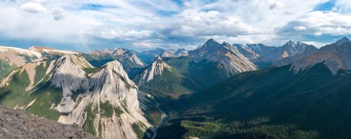 Mountain landscape with river valley and peaks