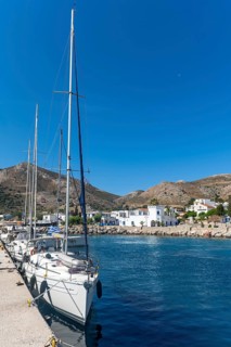 Sailboats in the harbour of Livadia on Tilos Island