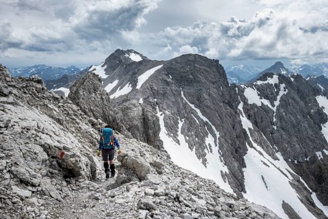 Hiker on a path on the rock