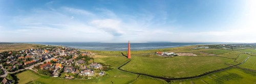 Large panorama drone shot of Huisduinen lighthouse
