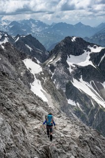 Hiker on a path on the rock