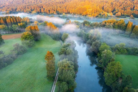 Clouds of fog over the Loisach River near Eurasburg