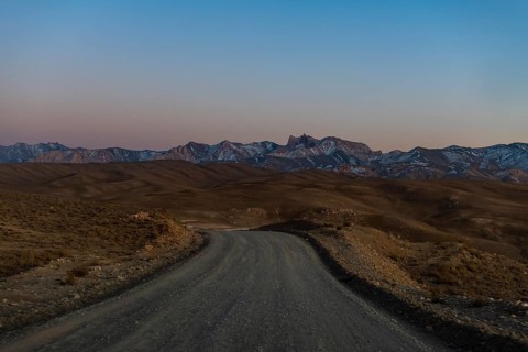 Snow capped mountain scnerey at sunset in the Unesco National Park