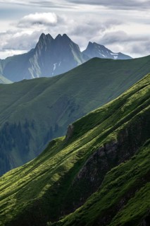 Grass-covered mountain flanks