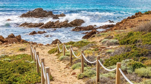 Surf on the rocky coast of Isola Maddalena