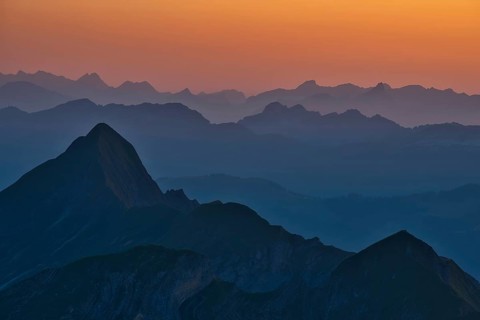 View of Bernese Alps at dusk from Brienzer Rothorn