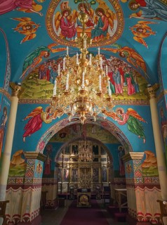Beautiful painted walls and ceiling inside the Capriana Monastery
